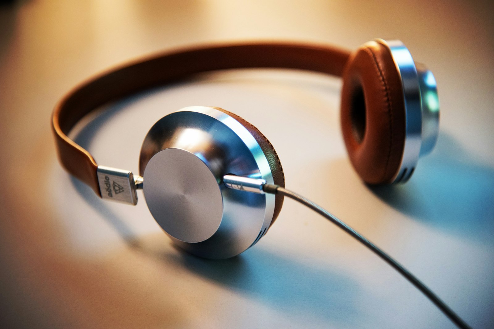 Person with headphones listening to recordings at a computer