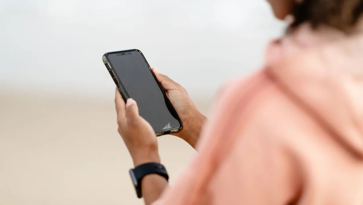 Woman checking a website on her smartphone