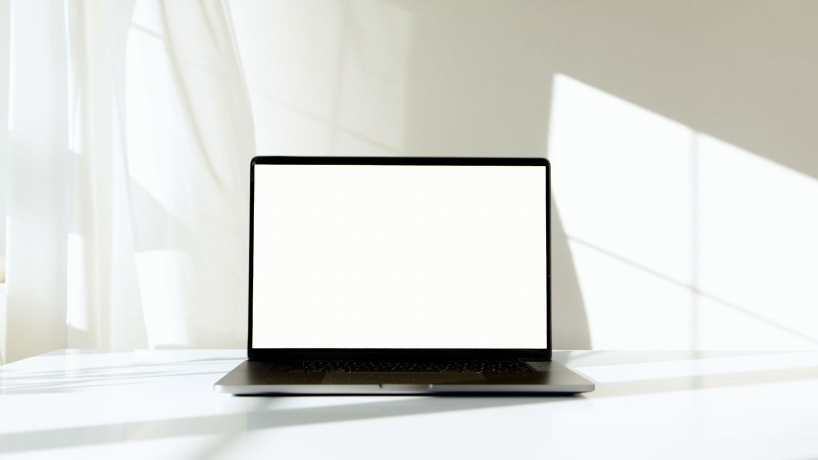 Website layout on a laptop and phone
