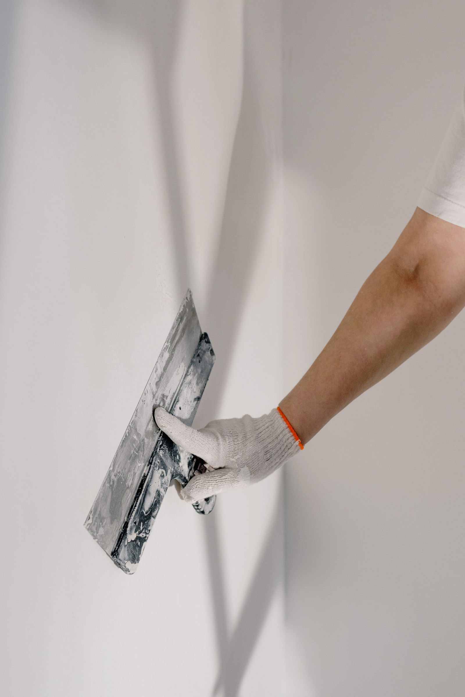 First-person view of hands using a screwdriver for a simple repair