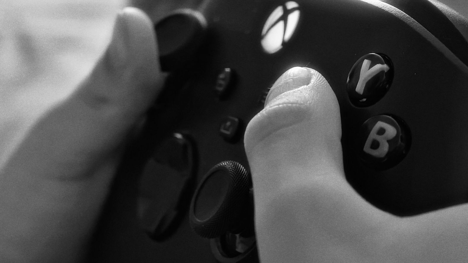 Hands holding a game controller