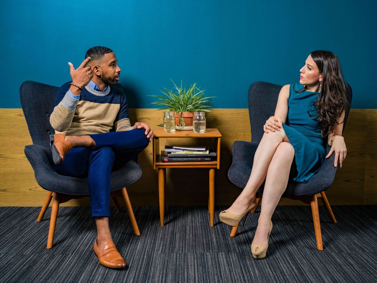 Two people talking in their native language
