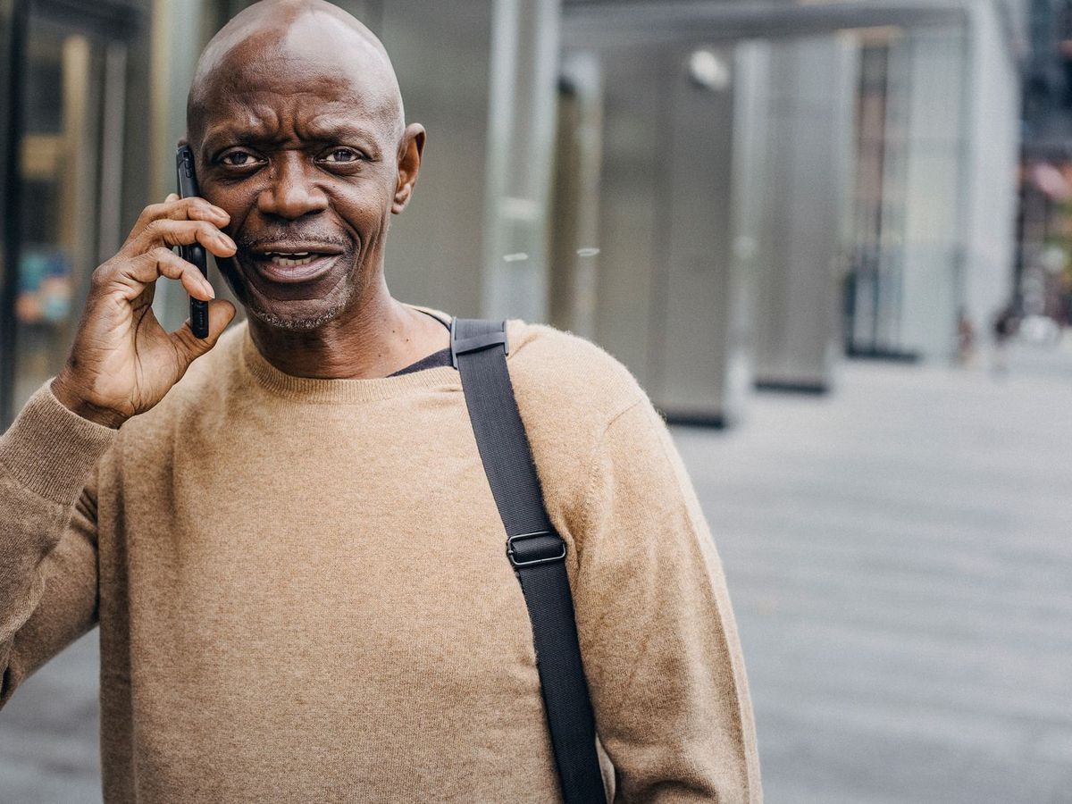 Person giving feedback on a phone