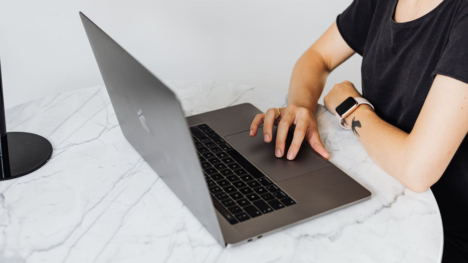 Person browsing a website on a laptop