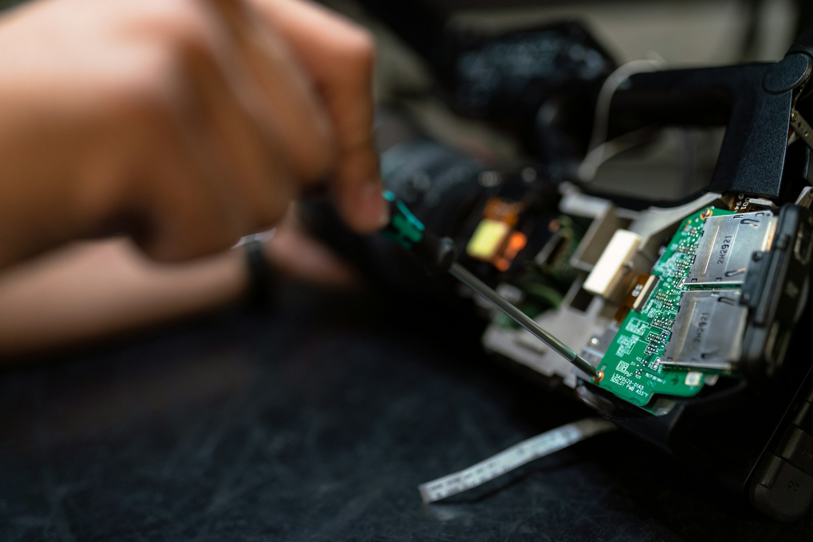 Hands assembling or sorting objects in close-up video