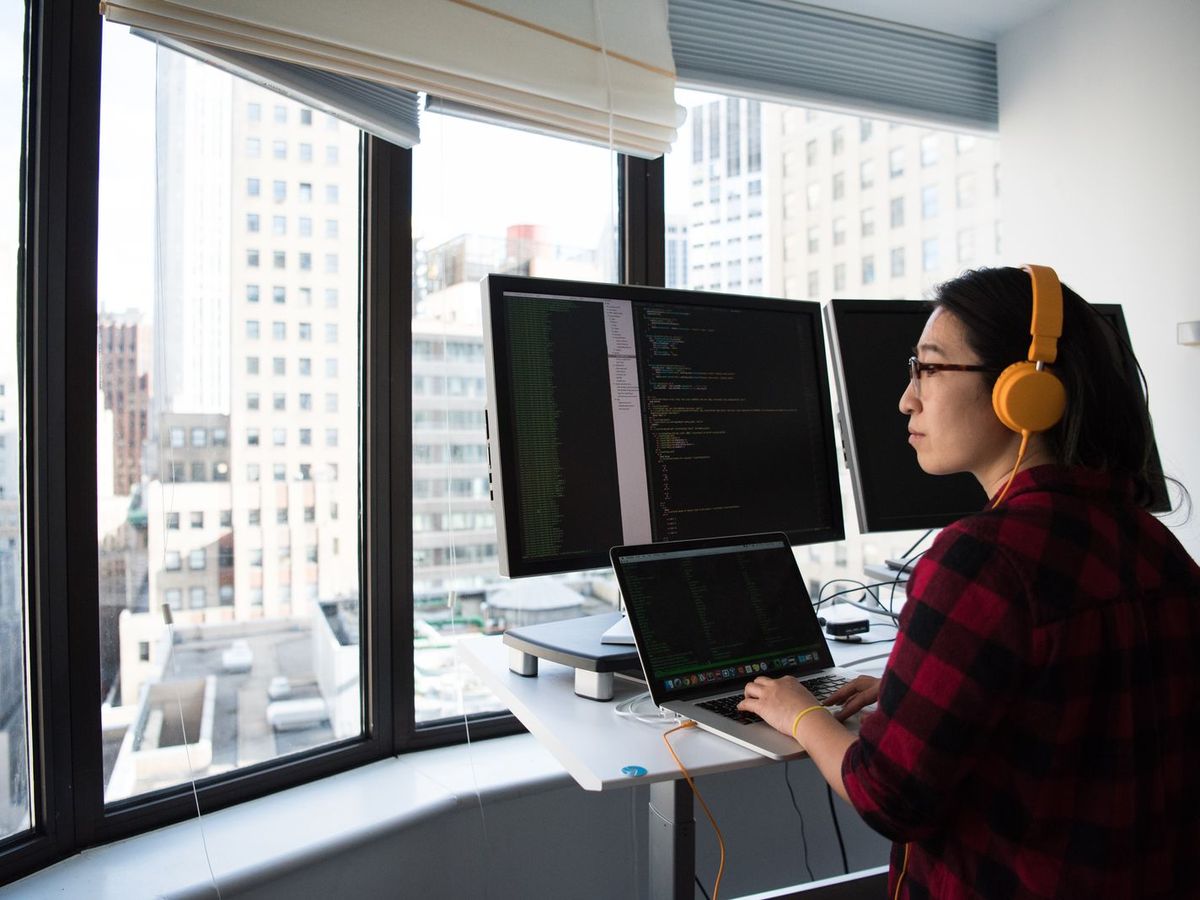 Developer reviewing bug reports