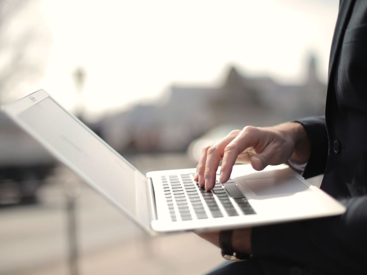 Person browsing a website at home