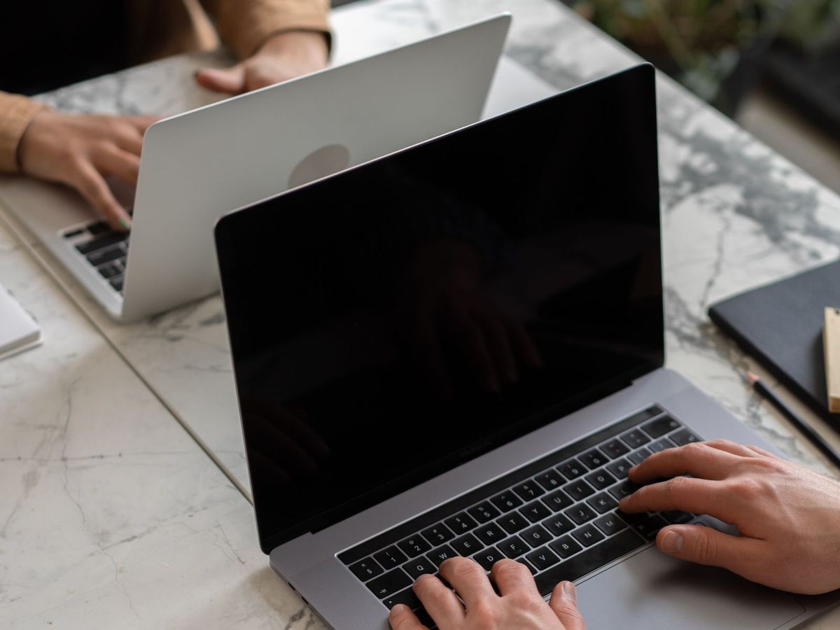 Checklist next to a laptop